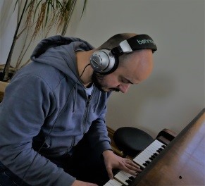 Adrian Tucker on Piano